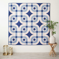 Inspired by a beautiful tile in her grandmother's Dominican Republic home, we love the movement and flow in this wonderfully bold design.Mercado Quilt Kits by Sewsupisous available at globalfibershop.com.