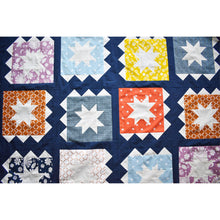 Load image into Gallery viewer, The Zippy Quilt Pattern is fat quarter friendly and utilizes one quilt block, rotated, to create movement.  Fabric requirements are included in this listing. Available at globalfibershop.com.
