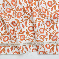 Floral patterned fabric with 'Fableism' branding on a white background. Available at globalfibershop.com.