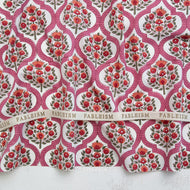 Patterned fabric with red floral design and 'Fableism' branding. Indian Block Print available at globalfibershop.com.