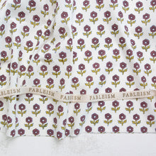 Load image into Gallery viewer, Floral patterned fabric with 'Fableism' branding on a white background. Indian Block Prints available at globalfibershop.com.
