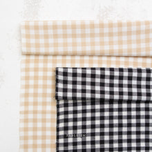 Load image into Gallery viewer, Black and white checkered fabric with 'NEW!' label and 'FABLEISM' branding. Camp Gingham vailable at globalfibershop.com.
