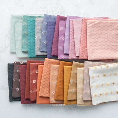 Introducing the Forest Forage collection by Fableism Supply Company.  Fablism's newest group of wovens features 2 new basics, Daisies and Honeycomb, in their signature earth-tone shades.  These wovens are excellent staples in quilting, homewares and apparel. Available at globalfibershop.com.