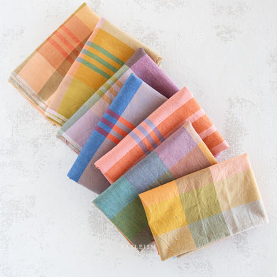 When you think light and cheery, think Lumiere. Fableism Supply Co.'s  brand new wide-width 100% cotton collection with rainbows galore. Made with the apparel sewist in mind, they created these sunshiny cottons in a sweeping bouquet of prismatic rainbow color. Go bold or go retro! These wide width plaids and checkers will make for dazzling pieces. Available at globalifbershop.com.