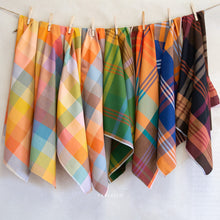 Load image into Gallery viewer, Selection of plaids on a clothes line from Lumiere Collection by Fableism Supply available at globalfibershop.com.

