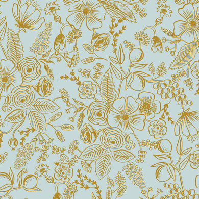 Gold floral pattern on a light blue background. Holiday Classics by Rifle Paper Company are a staple for holiday making. Gorgeous florals in modern color stories. Always fresh, relevant and beautiful! Available at globalfibershop.com.