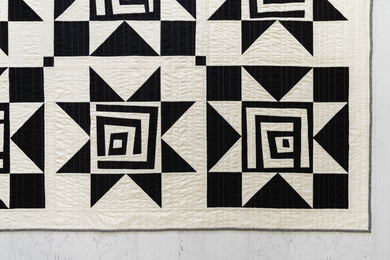 Black and White Shining Star quilt kit for Suzy Quilts sold at Global Fiber Shop.