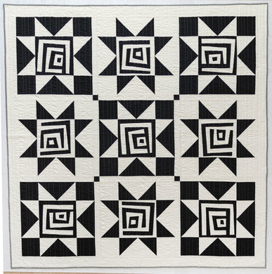 Black and White Shining Star quilt kit for Suzy Quilts sold at Global Fiber Shop.