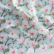 Gander the trees that produce the most beautiful of blooms, attracting lovely birds, butterflies, and bees to drink nectar, play in pollen, and seek shelter in their branches. Flowering trees features 13 prints on undyed organic cotton poplin. Sold at globalfibershop.com