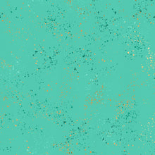 Load image into Gallery viewer, Speckled, brought to you by RSS designer Rashida Coleman Hall, features subtle speckled, (some metallic) blenders. We liken &quot;speckled&quot; to your happiest accident paint splatter turned perfect fabric background or blender. Sold at globalfibershop.com. Icebox is a teal green background with green and gold speckles.
