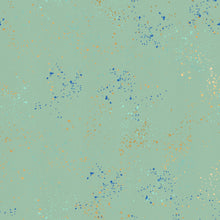 Load image into Gallery viewer, Speckled, brought to you by RSS designer Rashida Coleman Hall, features subtle speckled, (some metallic) blenders. We liken &quot;speckled&quot; to your happiest accident paint splatter turned perfect fabric background or blender. Sold at globalfibershop.com. Frost features a sage green background with blue and gold speckles.
