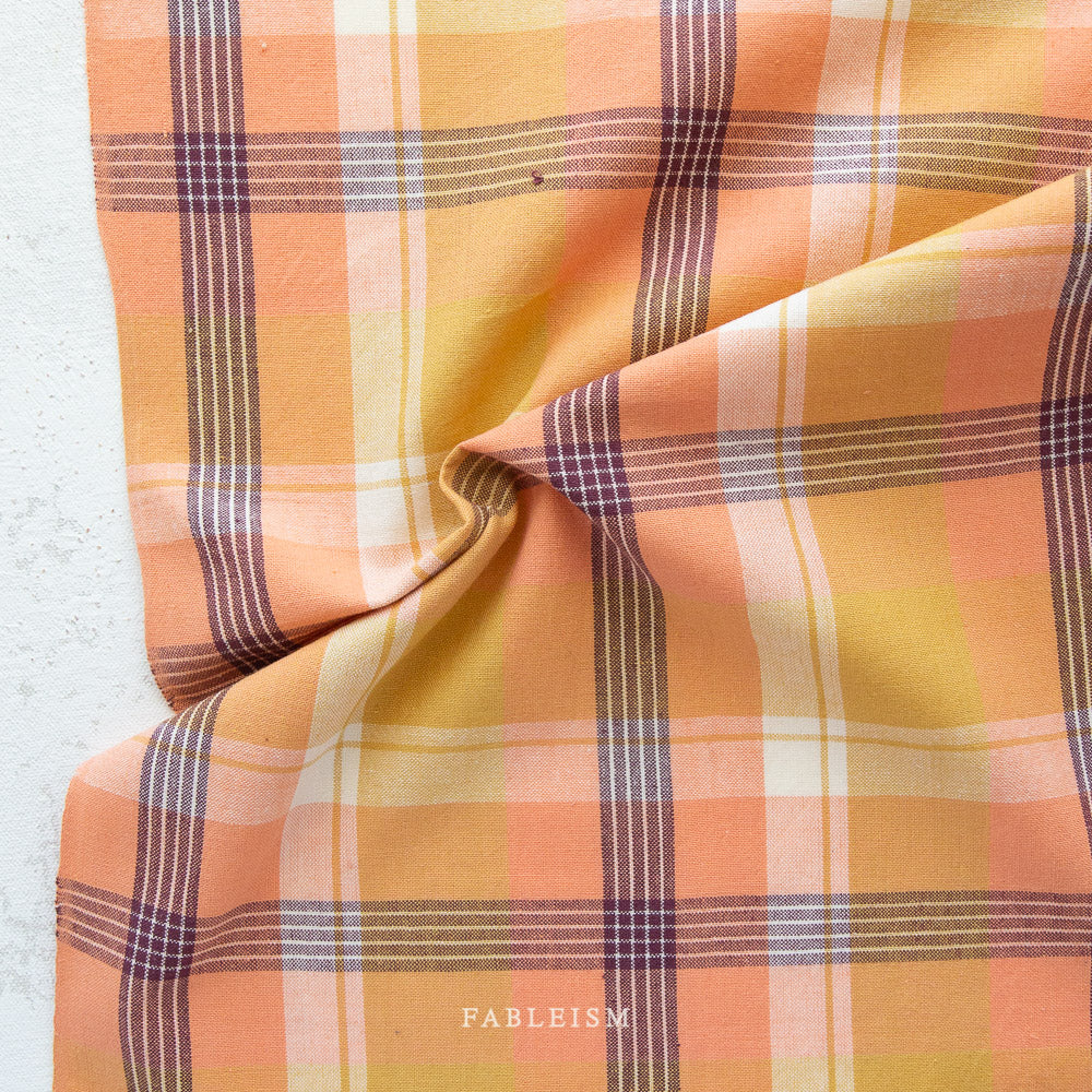 ntroducing the Arcade Wovens collection by Fableism Supply Company.  Arcade Wovens  features 15 shades of yarn-dyed wovens in Fabelism's signature earth tone palette inspired by natural elements .  Apricot features peach, gold and eggplant tones.These plaids are excellent staples in quilting, homewares and garments and make gorgeous quilt backs