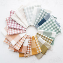 Load image into Gallery viewer, Camp Ginghams collection brings forth a classic woven style in gorgeous colors, reminiscent of retro camp uniforms. Think Moonrise Kingdom meets classic gingham! Camp Gingham is offering two sizes of yarn-dyed cotton gingham 3/8″ and 2.25″. Each size has a multitude of purposes from quilts, to apparel, to table settings! Sold at globalfibershop.com.
