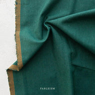 This debut collection from Fableism Supply Company features 28 shades of yarn-dyed wovens in stunning earth tones inspired by natural elements .  The small woven-X provides just enough texture to elevate this gorgeous substrate to the next level. Available at globafibershop.com.