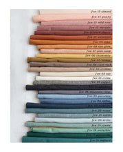 Load image into Gallery viewer, This debut collection from Fableism Supply Company features 28 shades of yarn-dyed wovens in stunning earth tones inspired by natural elements .  The small woven-X provides just enough texture to elevate this gorgeous substrate to the next level. Available at globafibershop.com.
